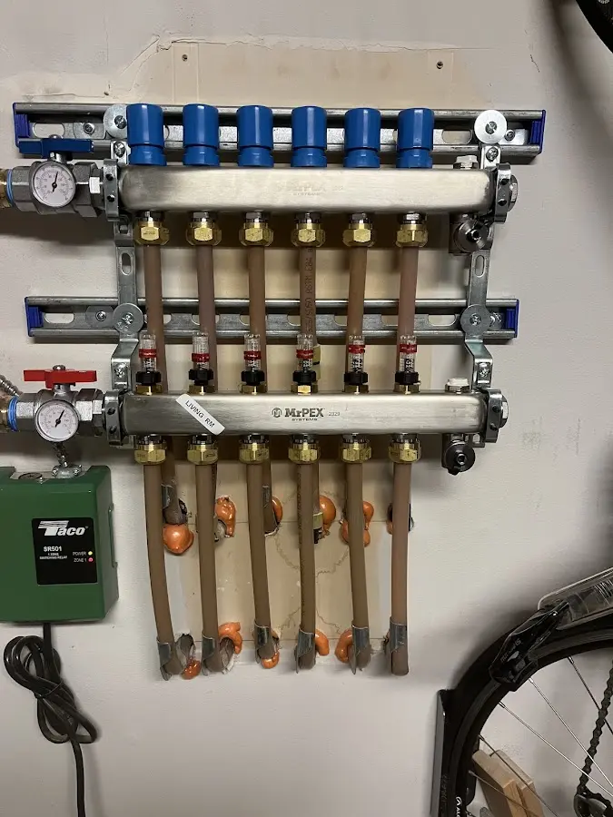 Plumber performing Water Heater Repair at a residential property in Menlo Park